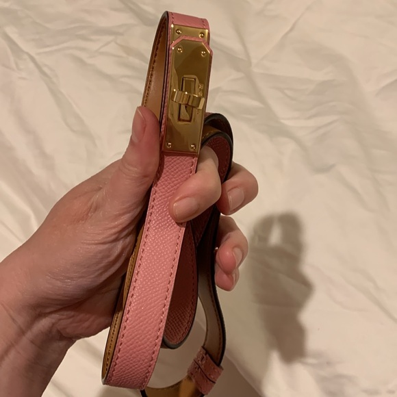 Thin  light pink golden buckle  fashionable belt size L adjustable 30.Must have!